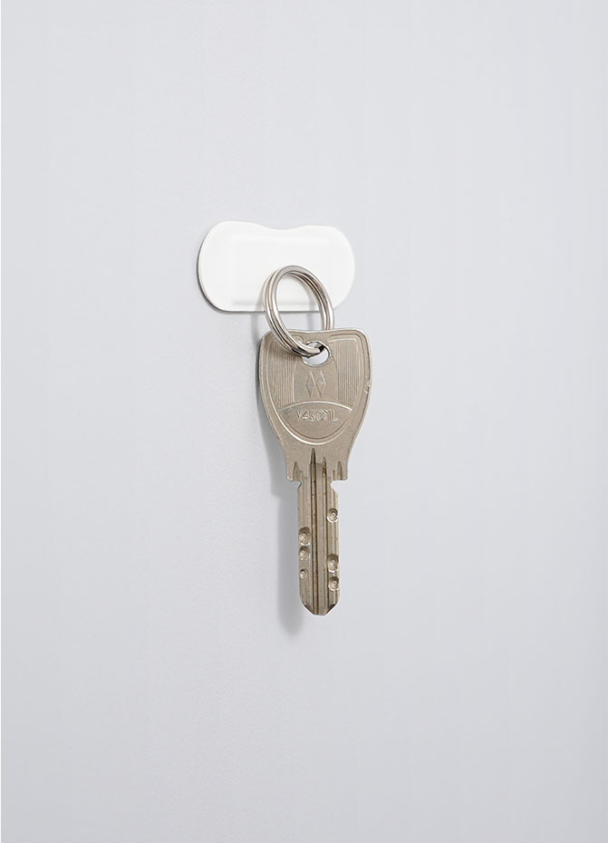Attach the key to the front door.